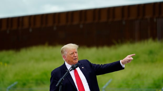 Kristi Noem says U.S. will paint Mexico border wall black, reviving long-standing Trump wish